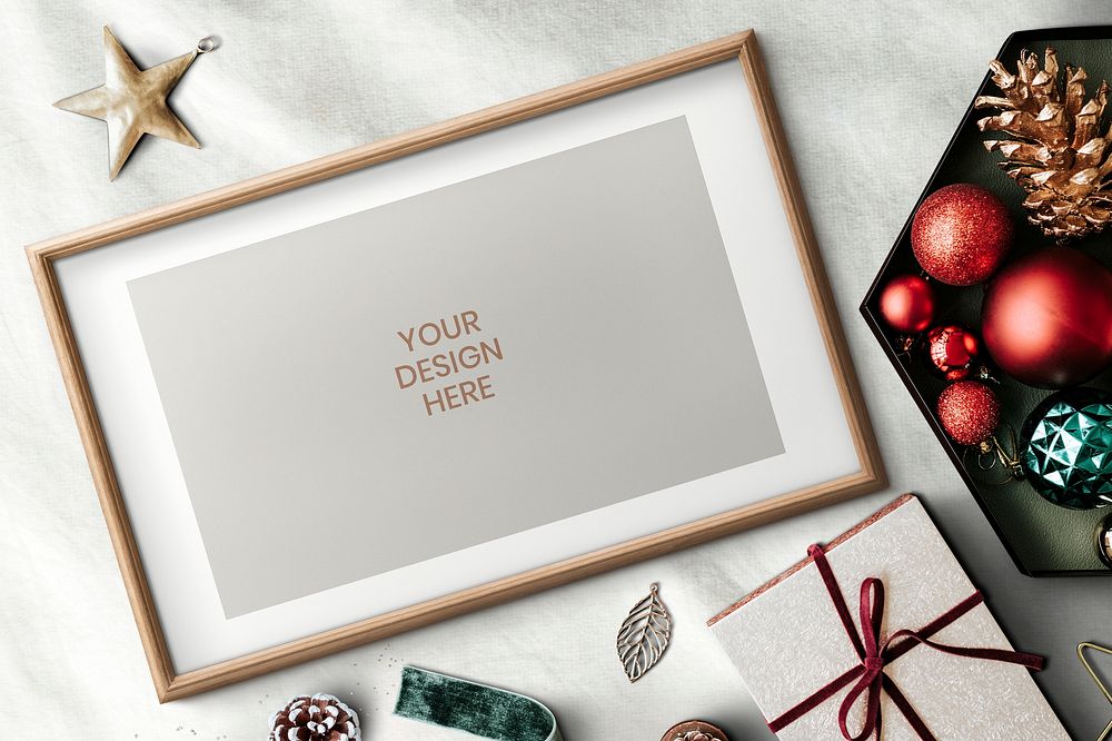 Wooden frame mockup with Christmas decorations