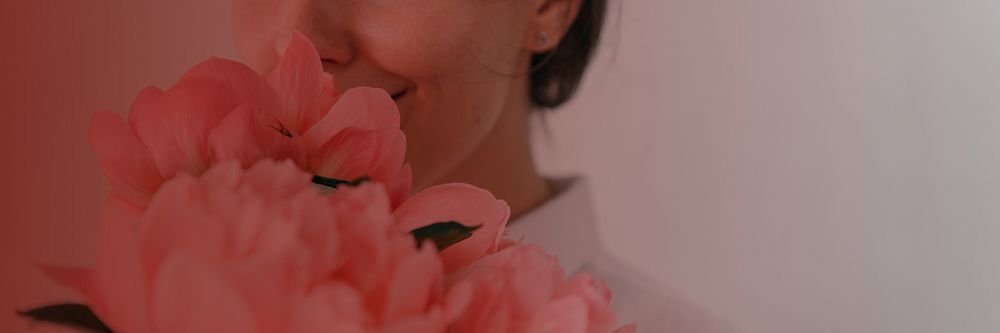Woman smelling flower background, pink design