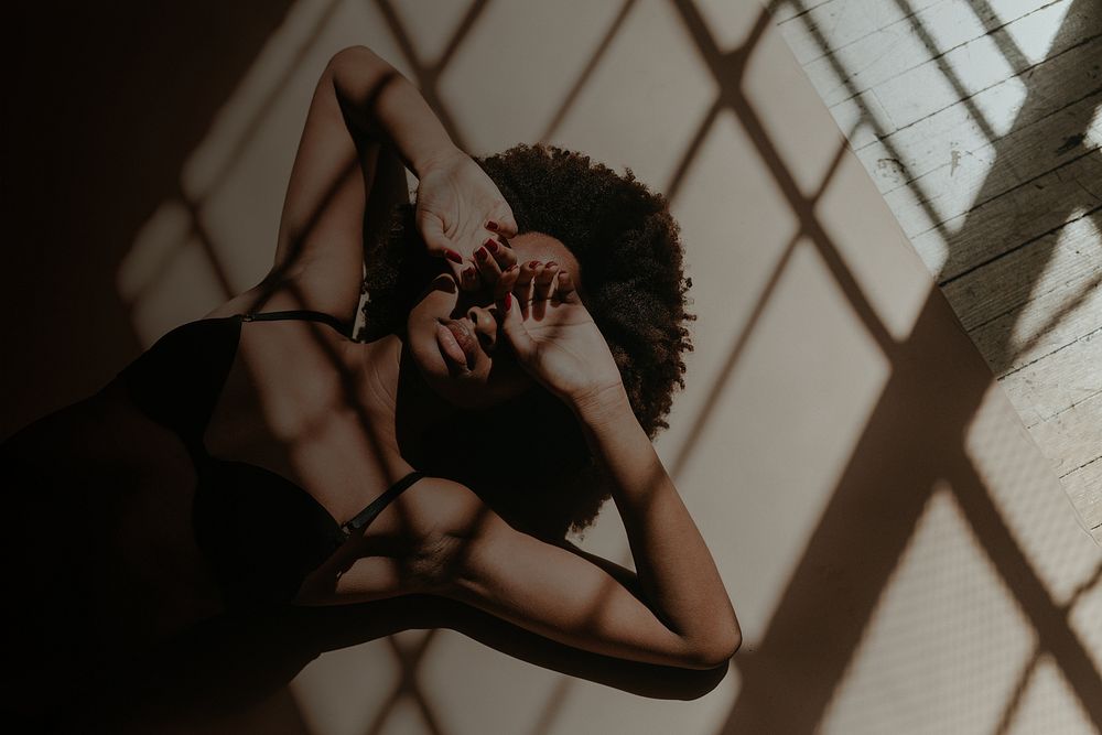 Woman background, laying on the ground, window shadow image