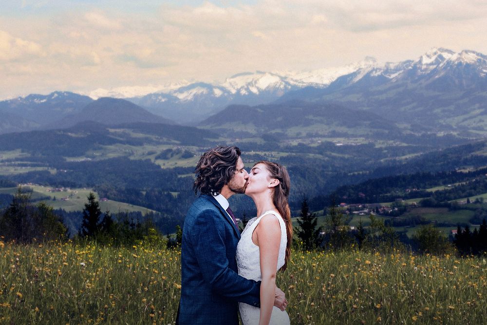 Groom & bride kissing, wedding and nature image