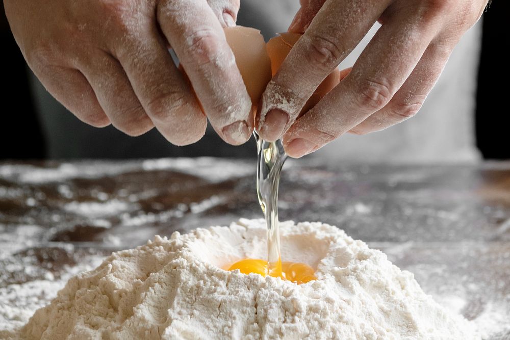 Egg mixing flour background, baking image