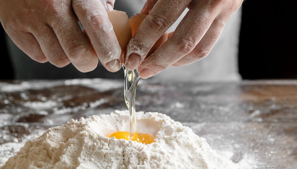 Egg mixing flour background, baking image