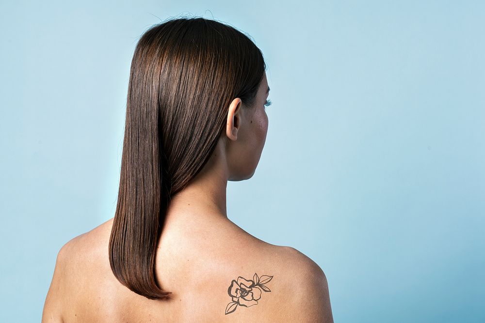 Woman's back tattoo mockup psd