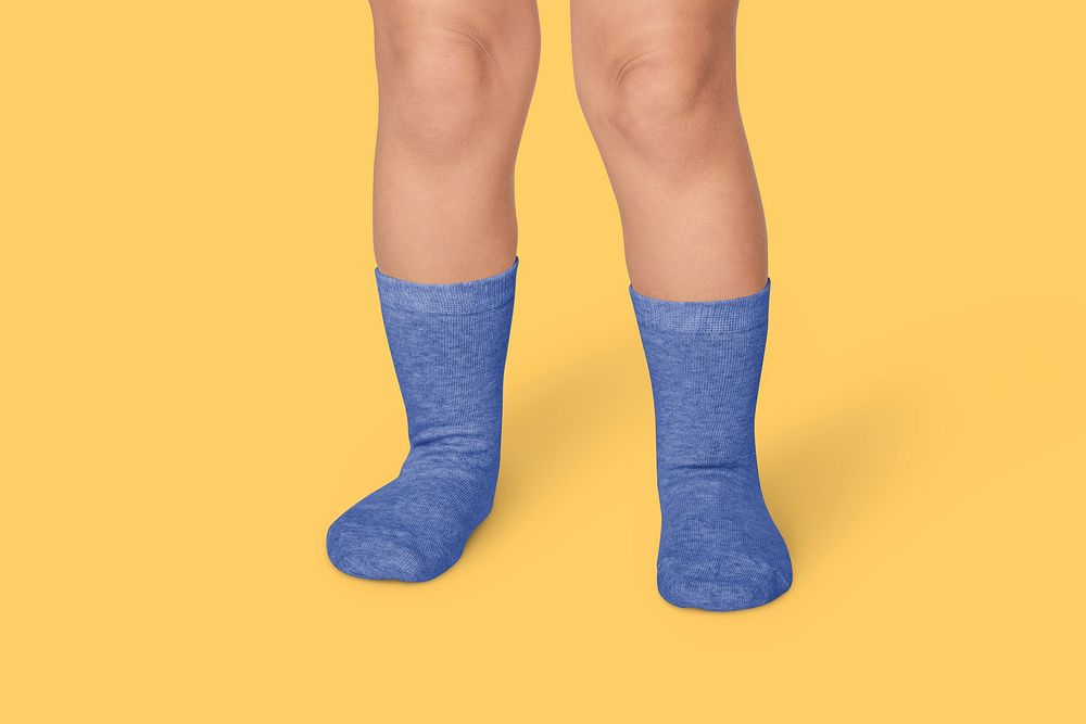 Kid's blue socks mockup psd in studio