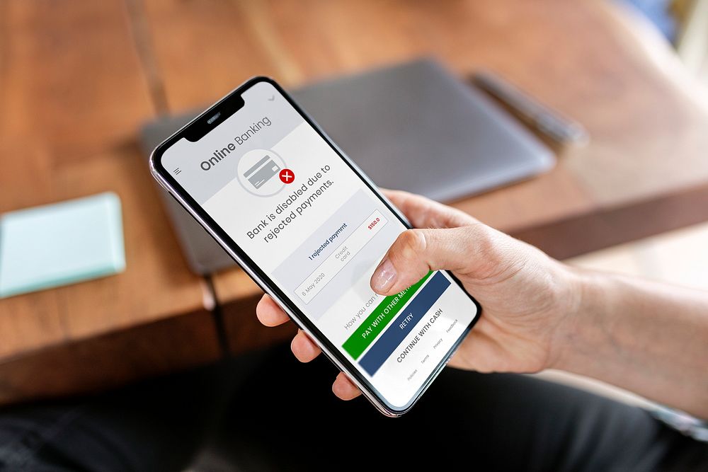 Woman using a mobile phone mockup with a disabled bank account due to rejected payments