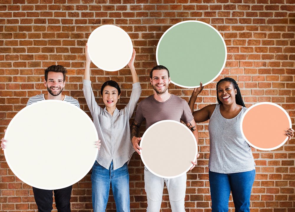 Business team holding blank signs