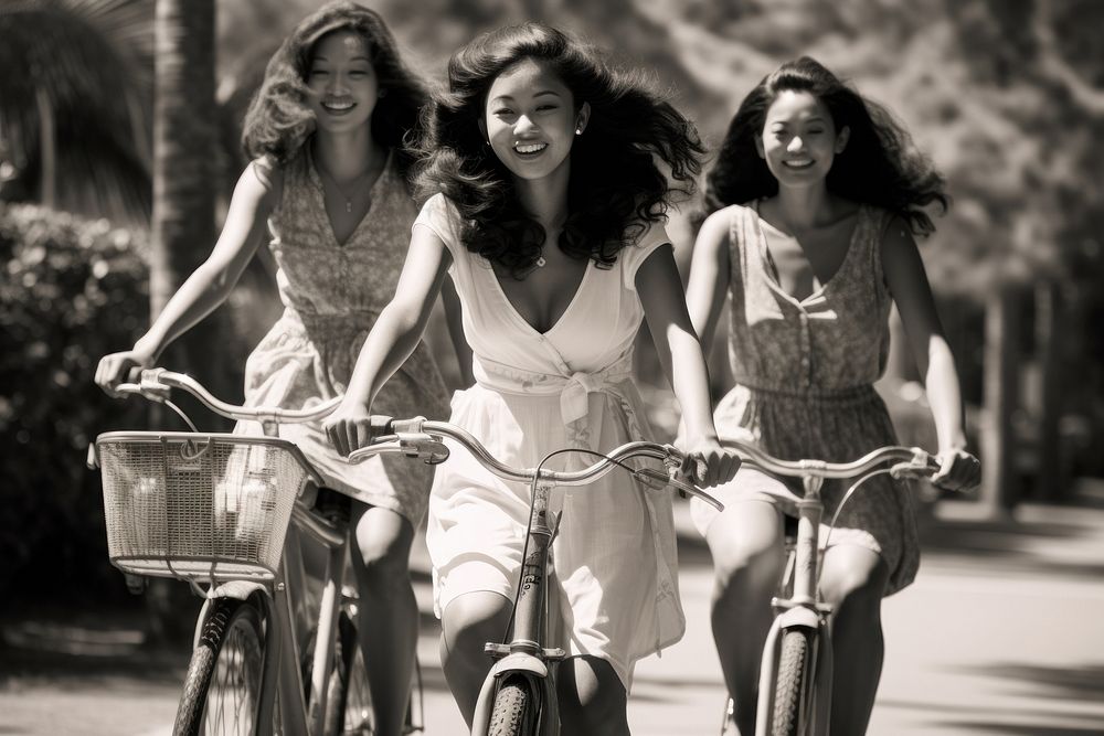 Asian women ride bicycles grayscale