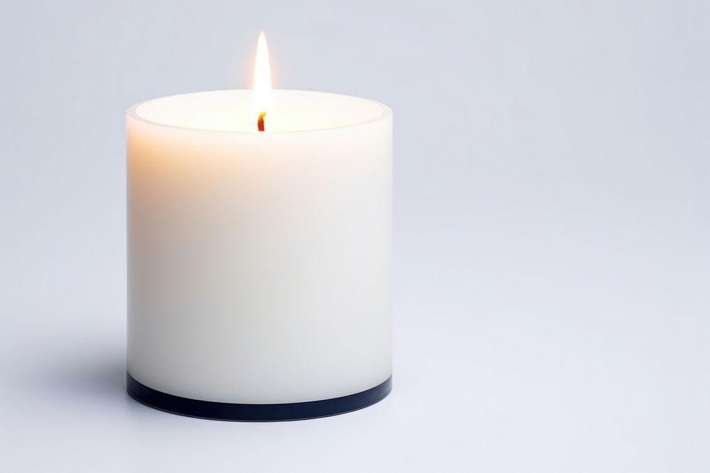 Candle lighting white background illuminated. AI generated Image by rawpixel.