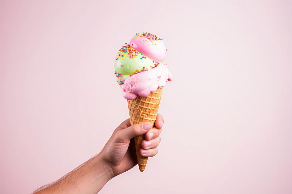 Dessert holding finger cream. AI generated Image by rawpixel.