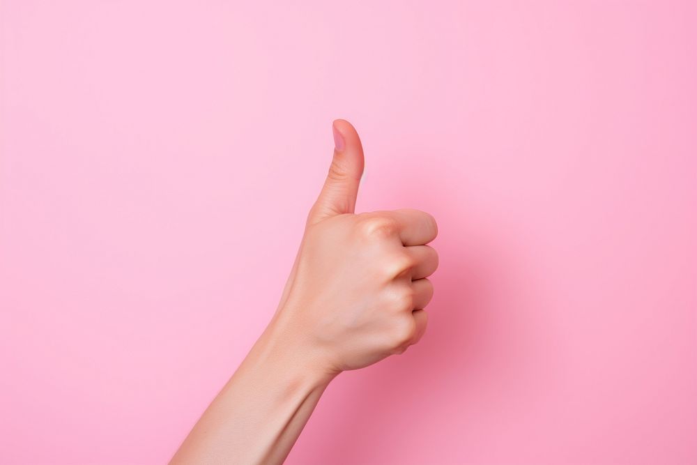 Hand finger pink pink background. 