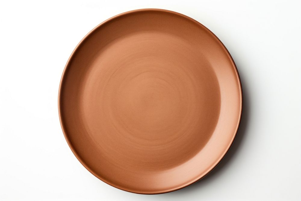 Plate brown white background earthenware. 