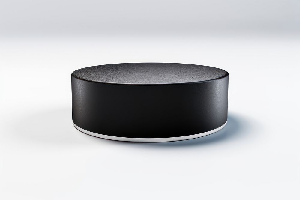 Hockey puck white background electronics technology. AI generated Image by rawpixel.