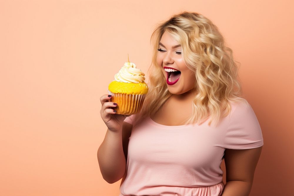 Cupcake eating adult food. 