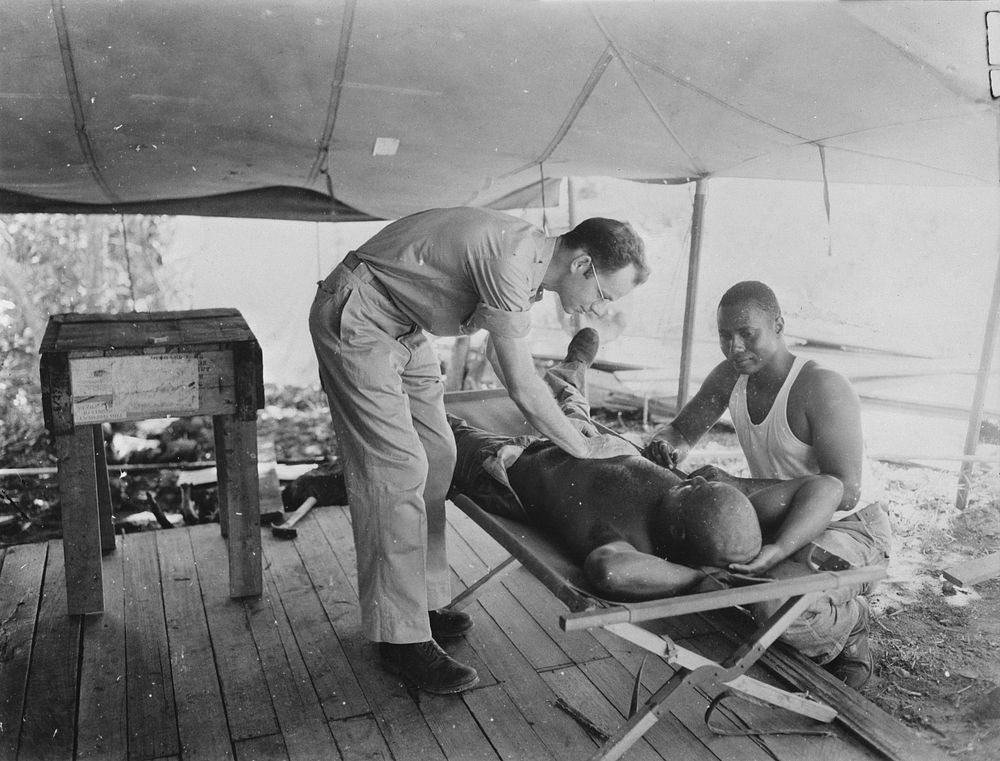 U.S. African American troops in New Guinea. Medical care is well provided for all American and allied forces in New Guinea.…