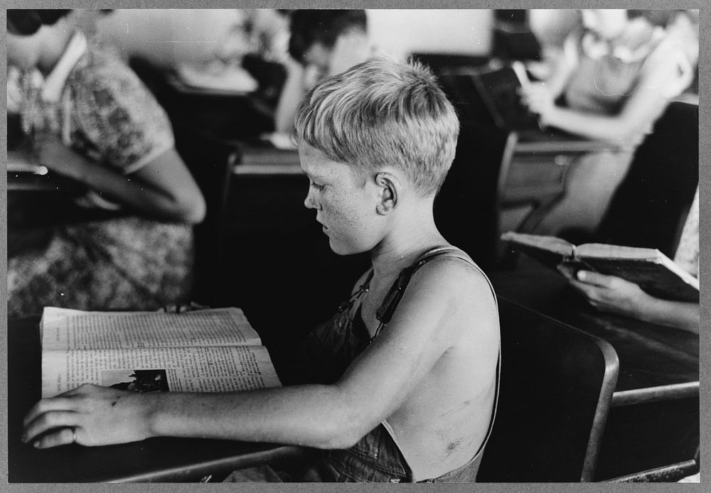 Child studying in school, Southeast Missouri Farms by Russell Lee