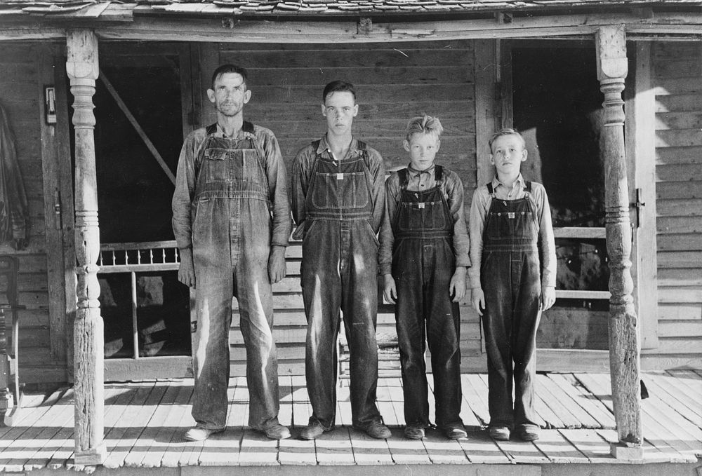 FSA (Farm Security Administration) client with three sons, Caruthersville, Missouri by Russell Lee