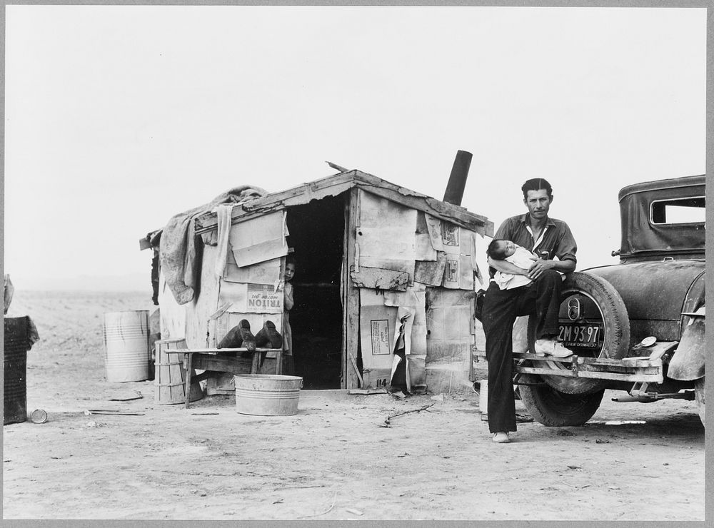 Migratory Mexican field worker's home on the edge of a frozen pea field. Imperial Valley, California. Sourced from the…