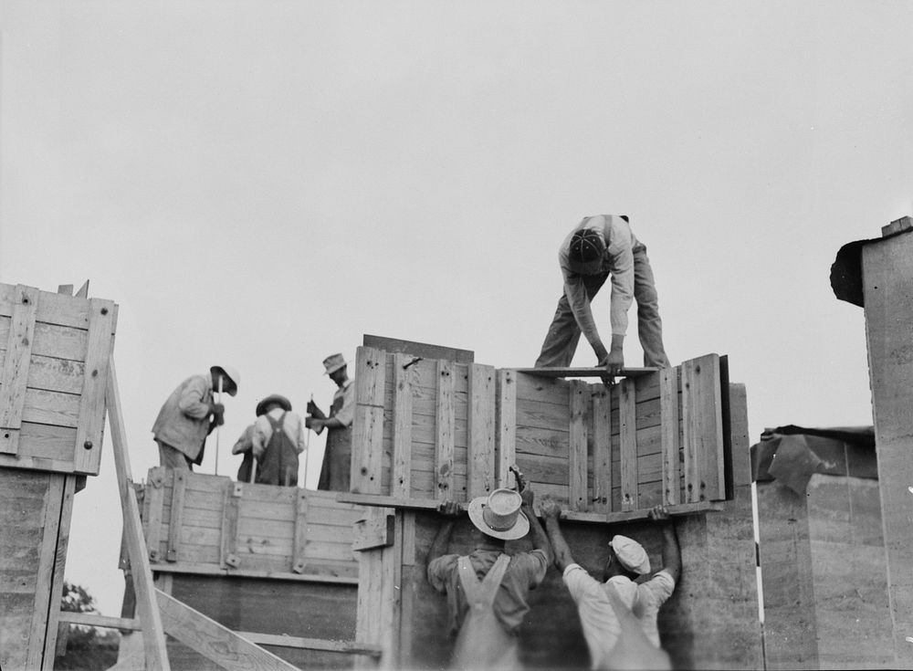 Rammed earth construction, near Birmingham. Form sections should not be larger than can be handled by a crew of three or…
