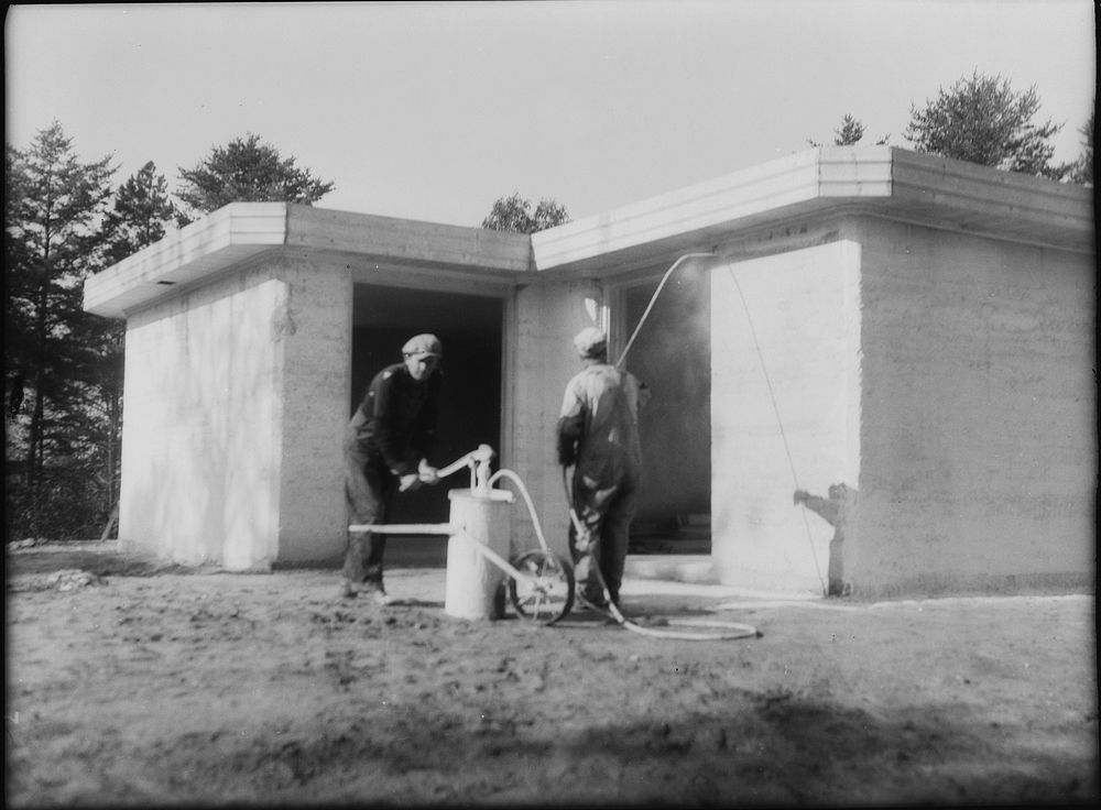 Whitewashing rammed earth house near Birmingham, Alabama. Sourced from the Library of Congress.