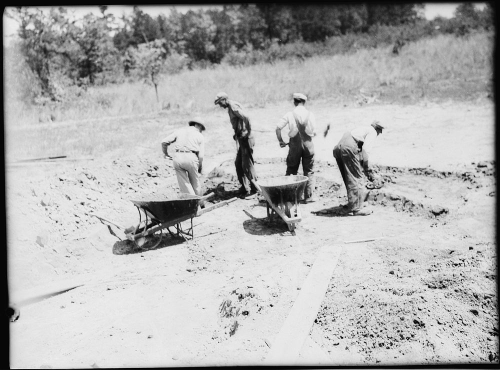 Digging dirt used in rammed earth construction near Birmingham, Alabama. Sourced from the Library of Congress.