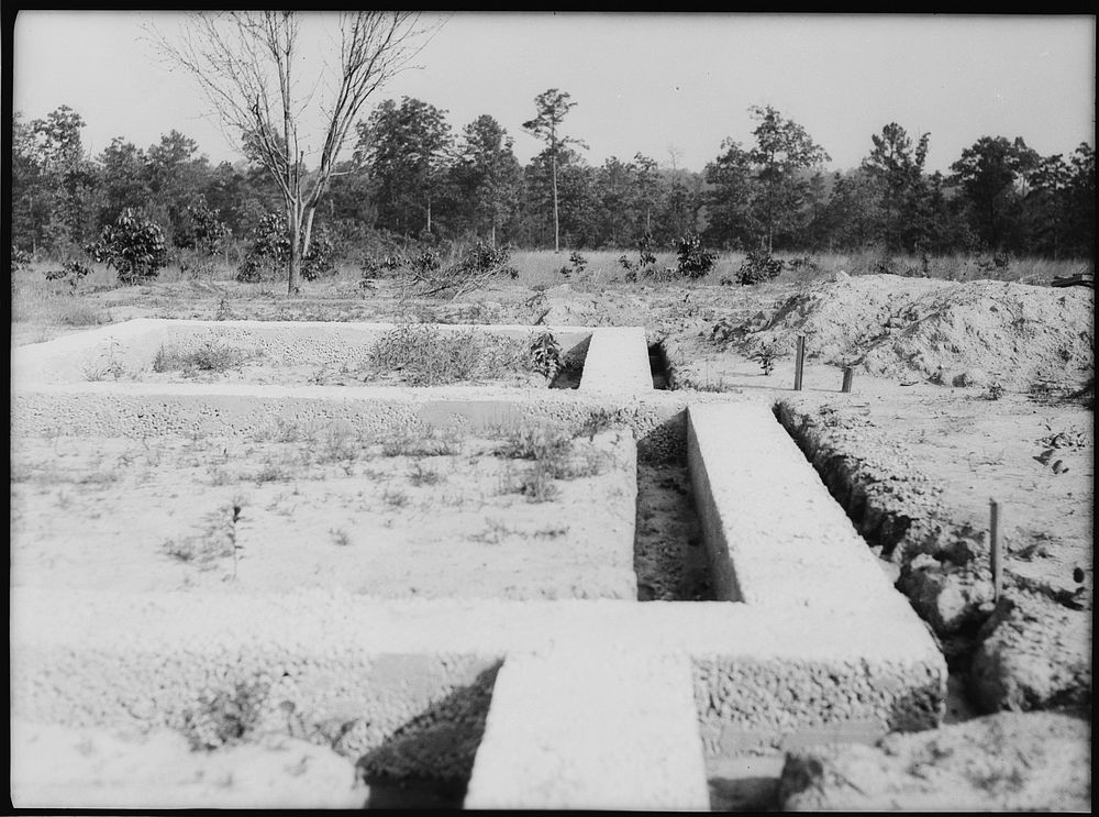 Rammed earth construction near Birmingham, Alabama. A depth of eleven inches is adequate for footings in the Gulf and South…