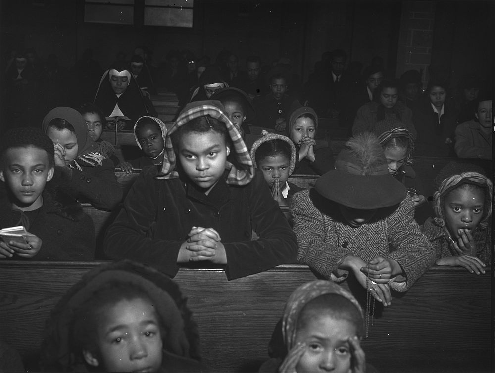 Mass at a  Catholic church on the South Side, Chicago, Illinois. Sourced from the Library of Congress.