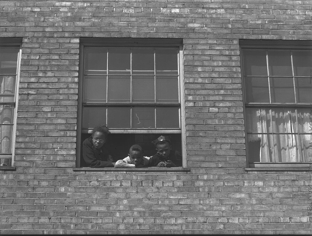 Chicago, Illinois. Ida B. Wells Housing Project. Children who live in one of the apartments. Sourced from the Library of…