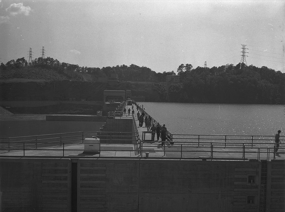 Watts Bar Dam, Tennessee. Tennessee Valley Authority. Workers crossing the dam. Sourced from the Library of Congress.