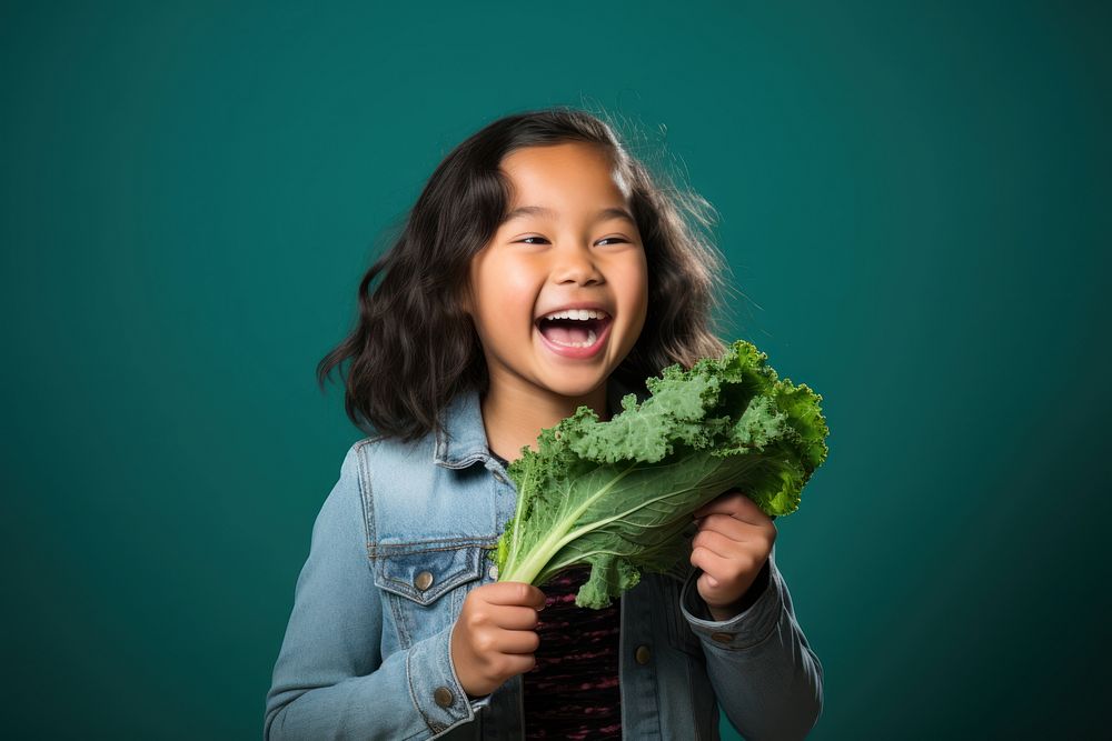 Vegetable laughing child happy. AI generated Image by rawpixel.
