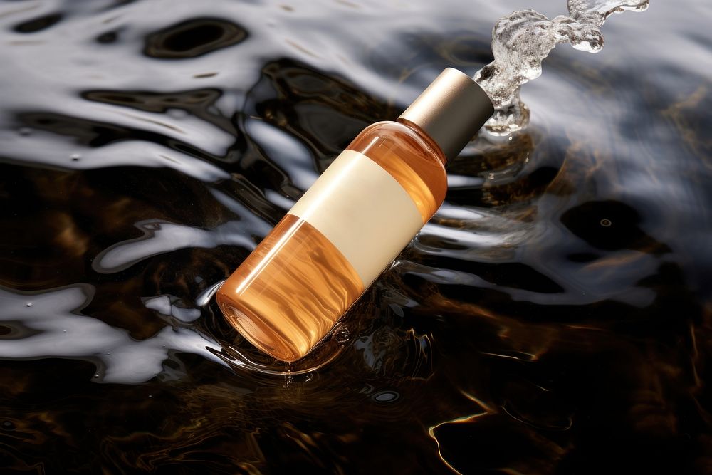 Bottle cosmetics perfume reflection. AI generated Image by rawpixel.