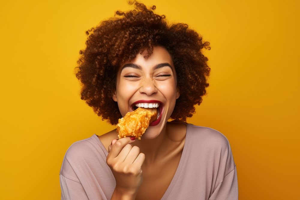 Eating portrait yellow bread. 