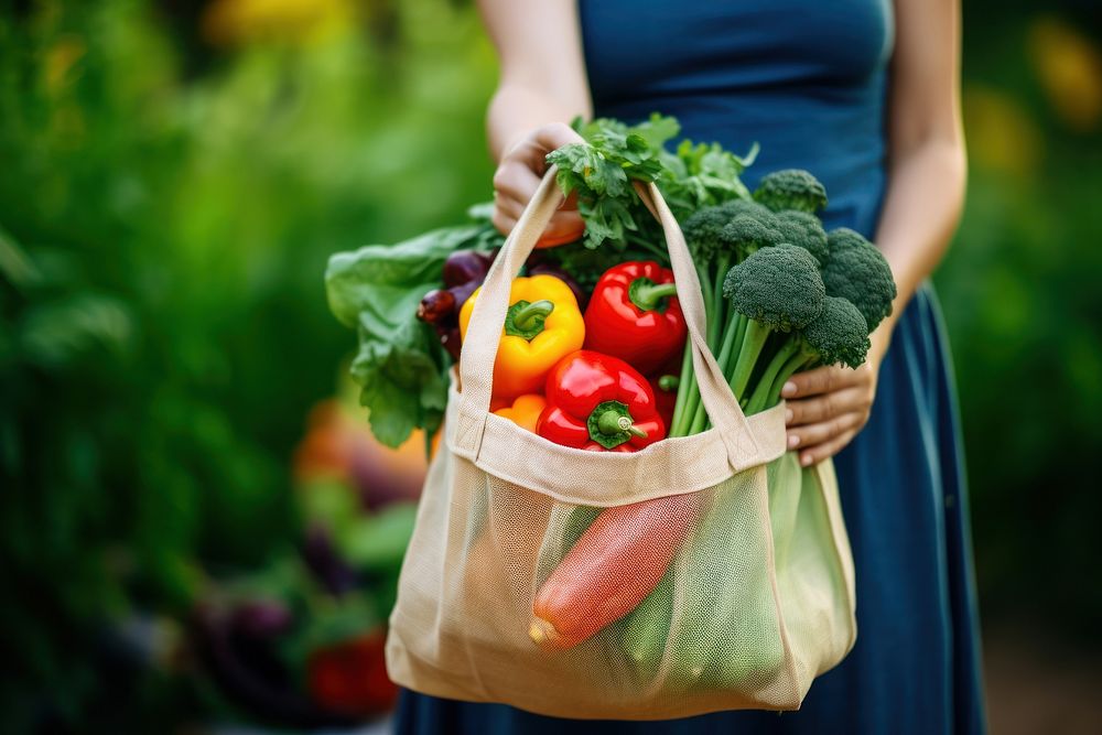 Bag vegetable holding market. AI generated Image by rawpixel.