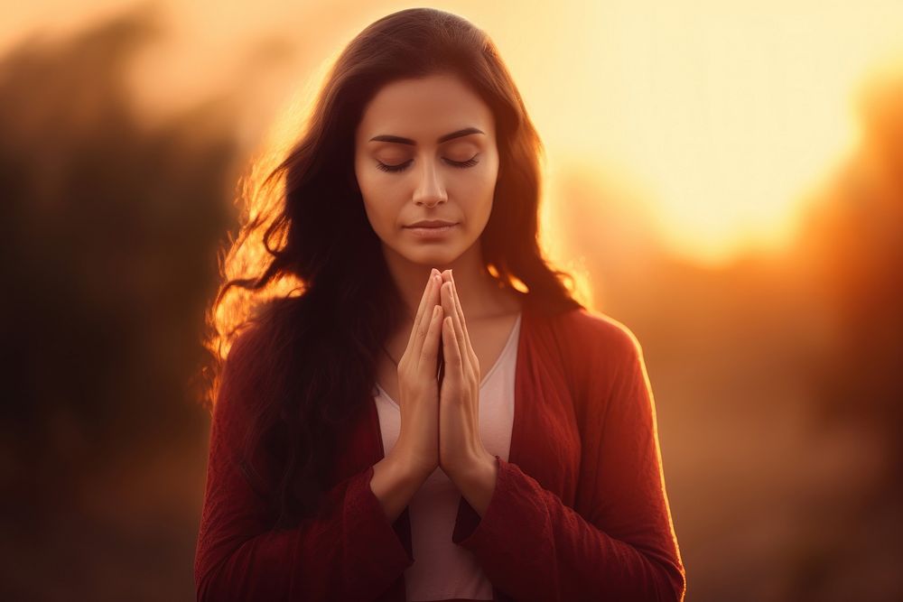 Praying sunset adult woman. AI generated Image by rawpixel.