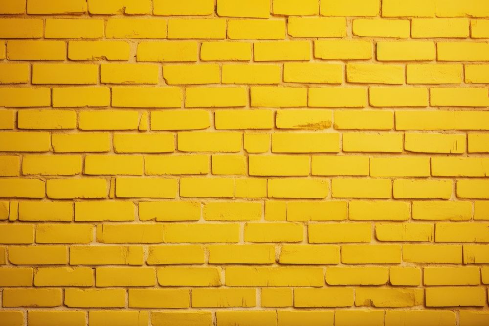 Yellow backgrounds brick wall. 