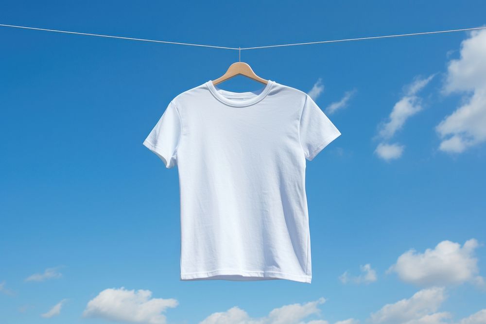 T-shirt sleeve sky tranquility. AI generated Image by rawpixel.