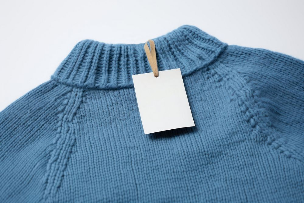 Sweater text blue coathanger. AI generated Image by rawpixel.