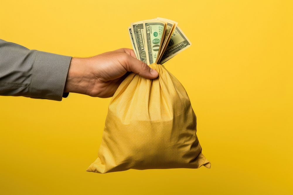 Money bag holding yellow. AI generated Image by rawpixel.