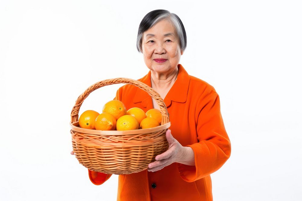 Basket holding orange fruit. AI generated Image by rawpixel.