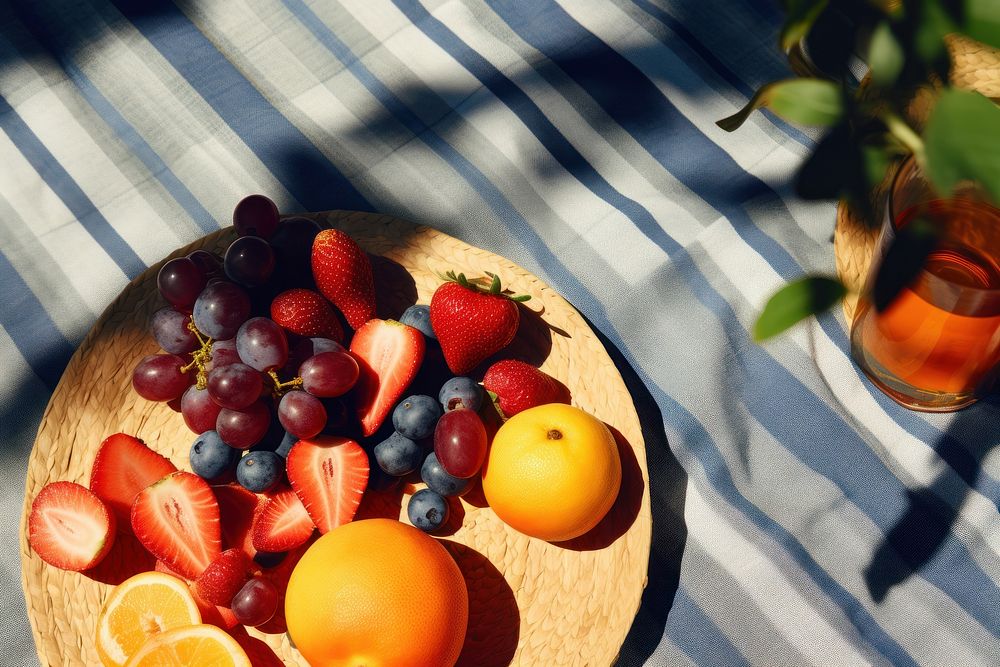 Fruit grapefruit blueberry outdoors. AI generated Image by rawpixel.