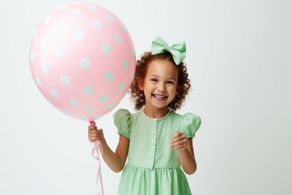 Balloon portrait holding dress. 