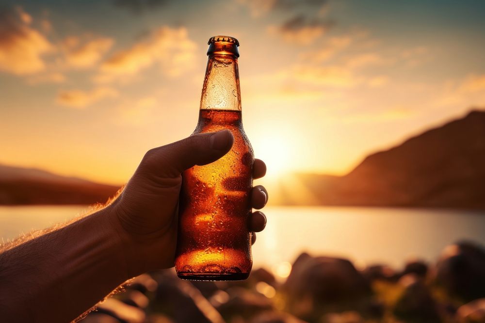 Bottle beer sunset drink. AI generated Image by rawpixel.