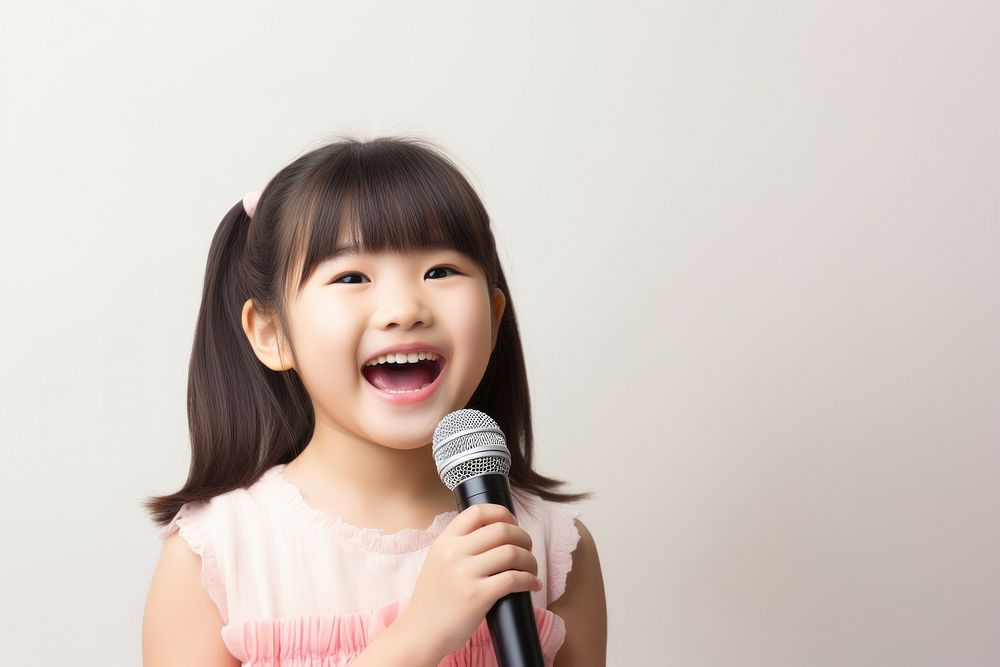 Microphone karaoke child photo. AI generated Image by rawpixel.
