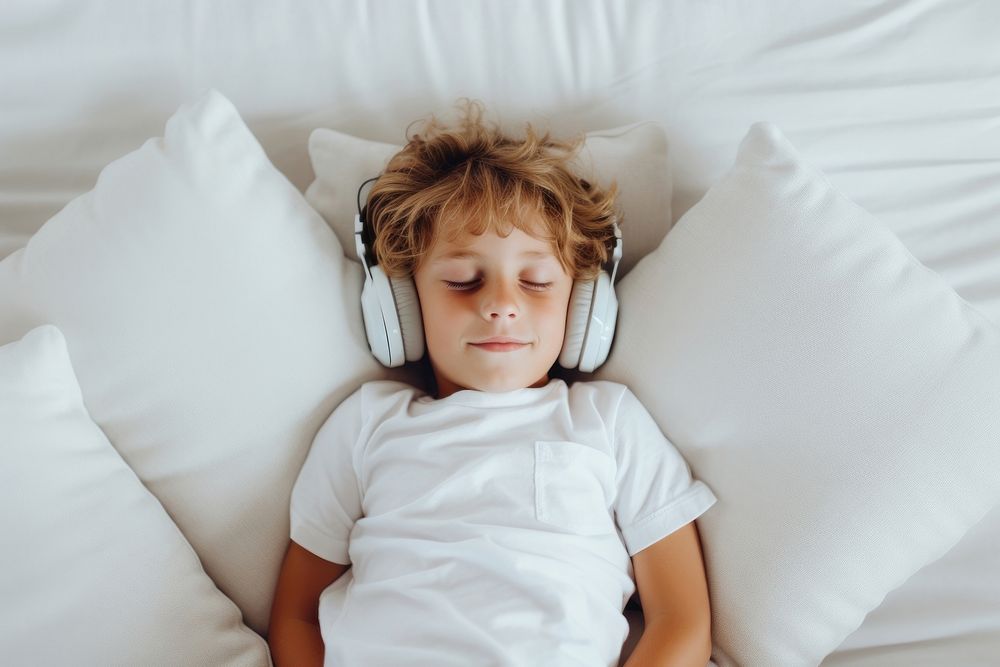 Headphones sleeping comfortable electronics. AI generated Image by rawpixel.