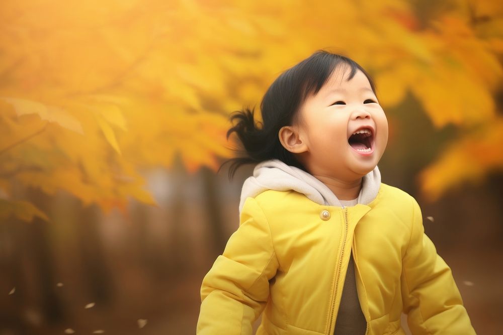 Baby laughing autumn child. AI generated Image by rawpixel.