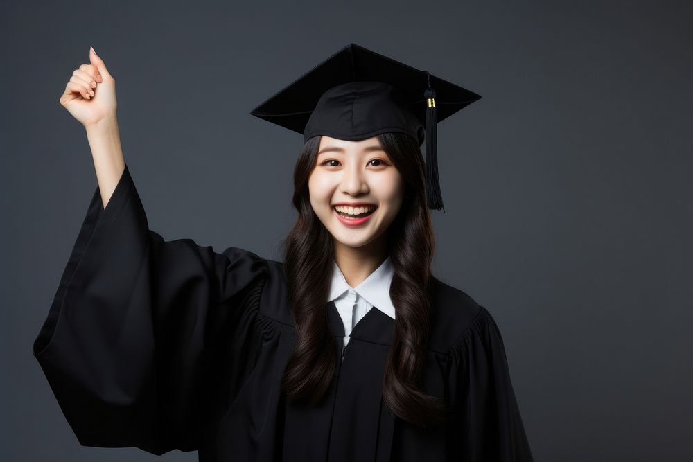 Graduation smiling holding student. 