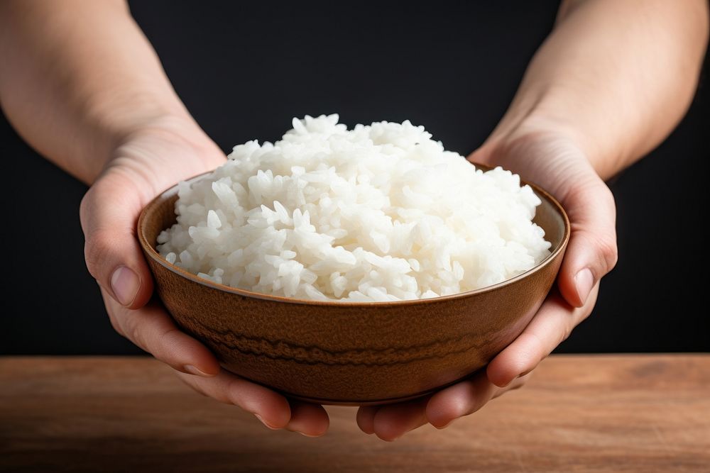 Rice holding white food. AI generated Image by rawpixel.