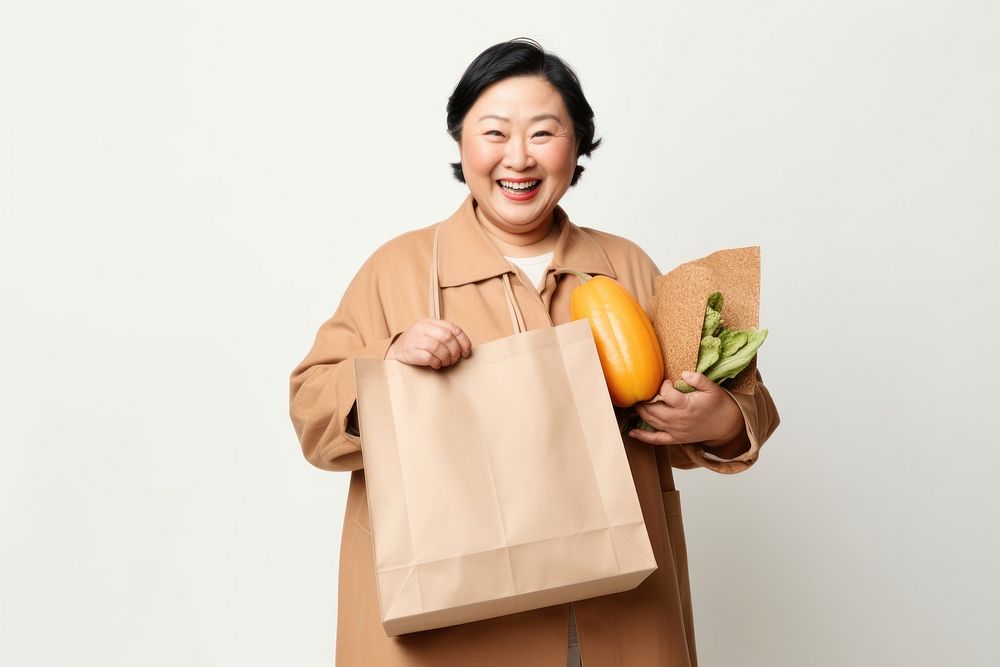 Bag portrait holding smile. 