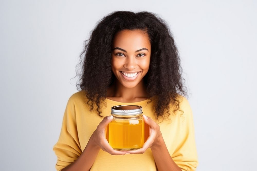 Honey jar portrait holding. AI generated Image by rawpixel.