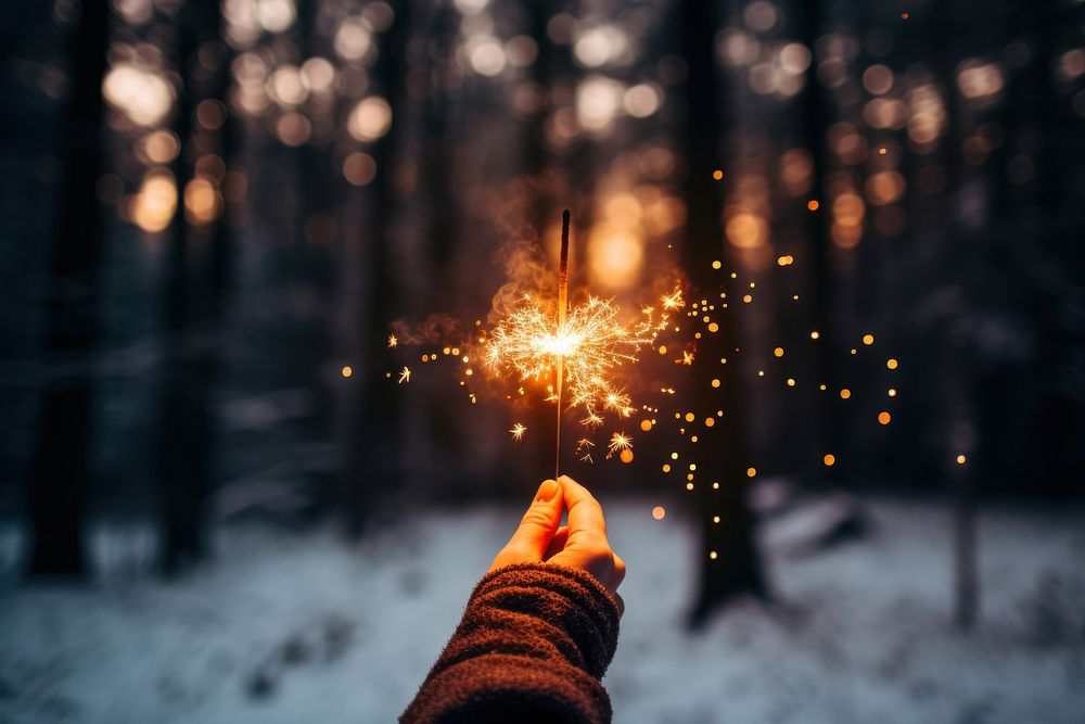 Sparkler burning sparks photo. AI generated Image by rawpixel.
