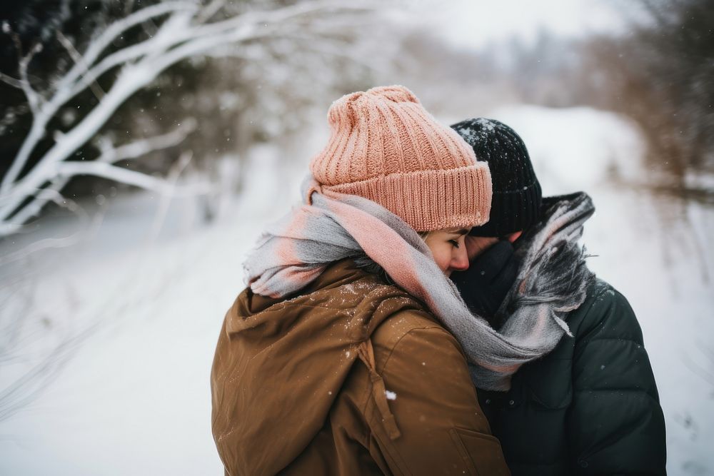 Outdoors hugging winter nature. 